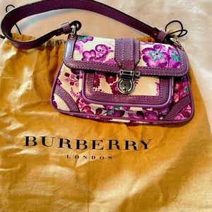 Burberry gorgeous wristlet! Never used! Gorgeous purple flower detail!